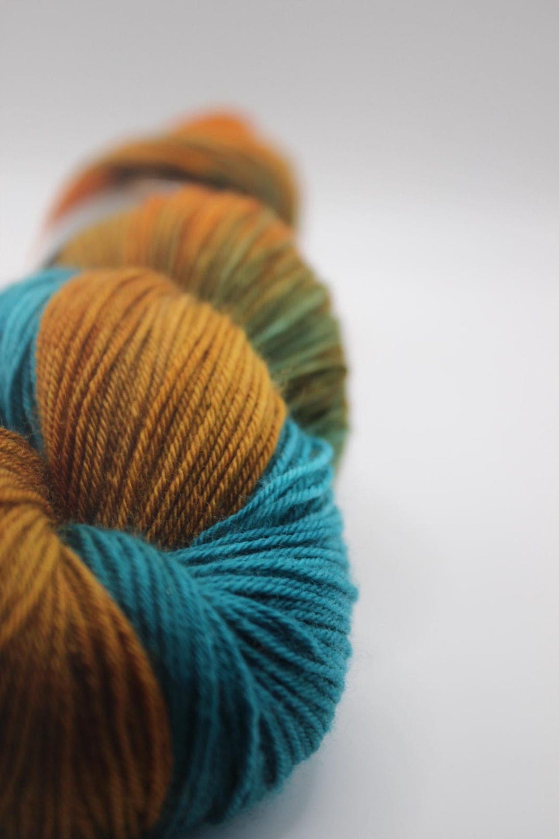 Reef and Rust - 100g Superwash Platinum Sock Yarn
